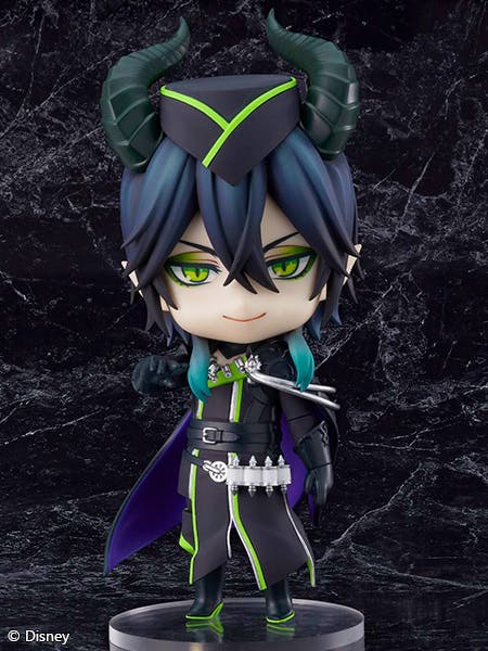 Front-facing Nendoroid figure of Malleus Draconia wearing a dark outfit with green accents and large horns on a round display base.