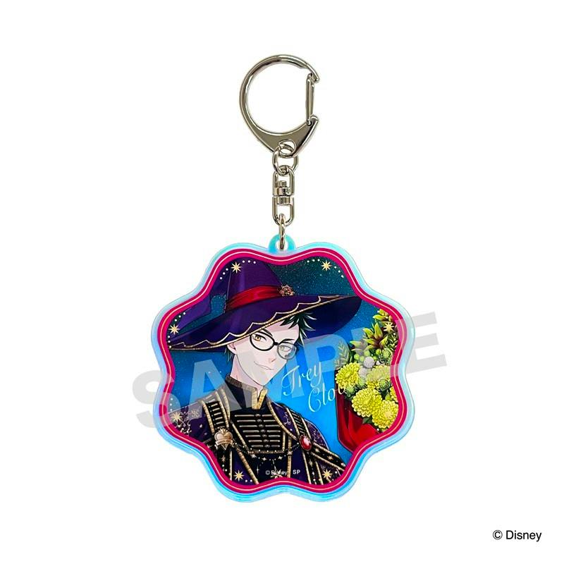 Photograph of the acrylic keychain showing the Twisted Wonderland character Trey in a starry hat and ornate outfit, attached to a metal keyring (SAMPLE watermark visible).