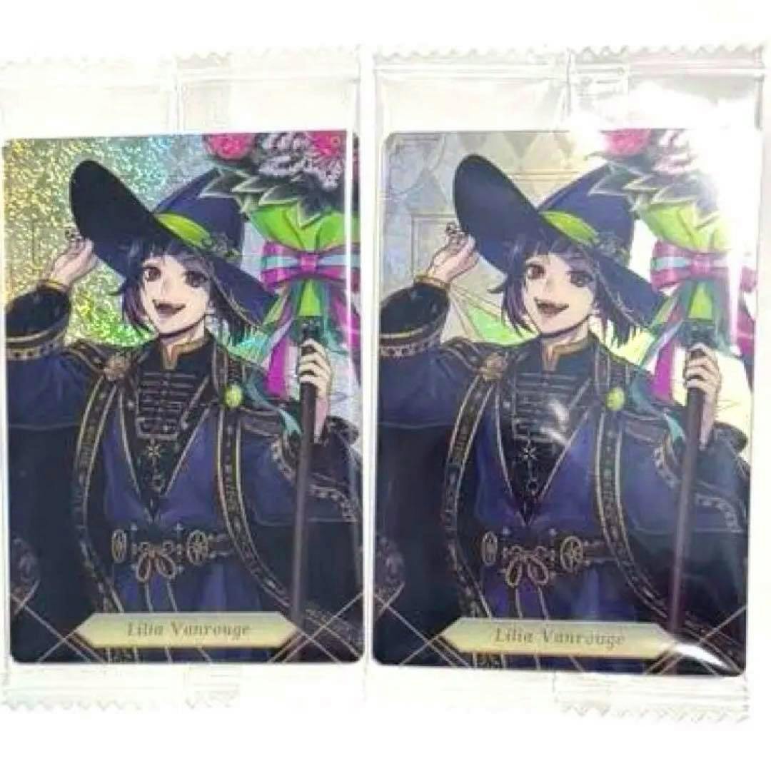 Photo of two packaged photocards of the character Lilia from Twisted-Wonderland, one with a holographic background.