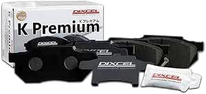 DIXCEL KP Type front brake pads displayed with a DIXCEL K Premium box and a small white grease packet.