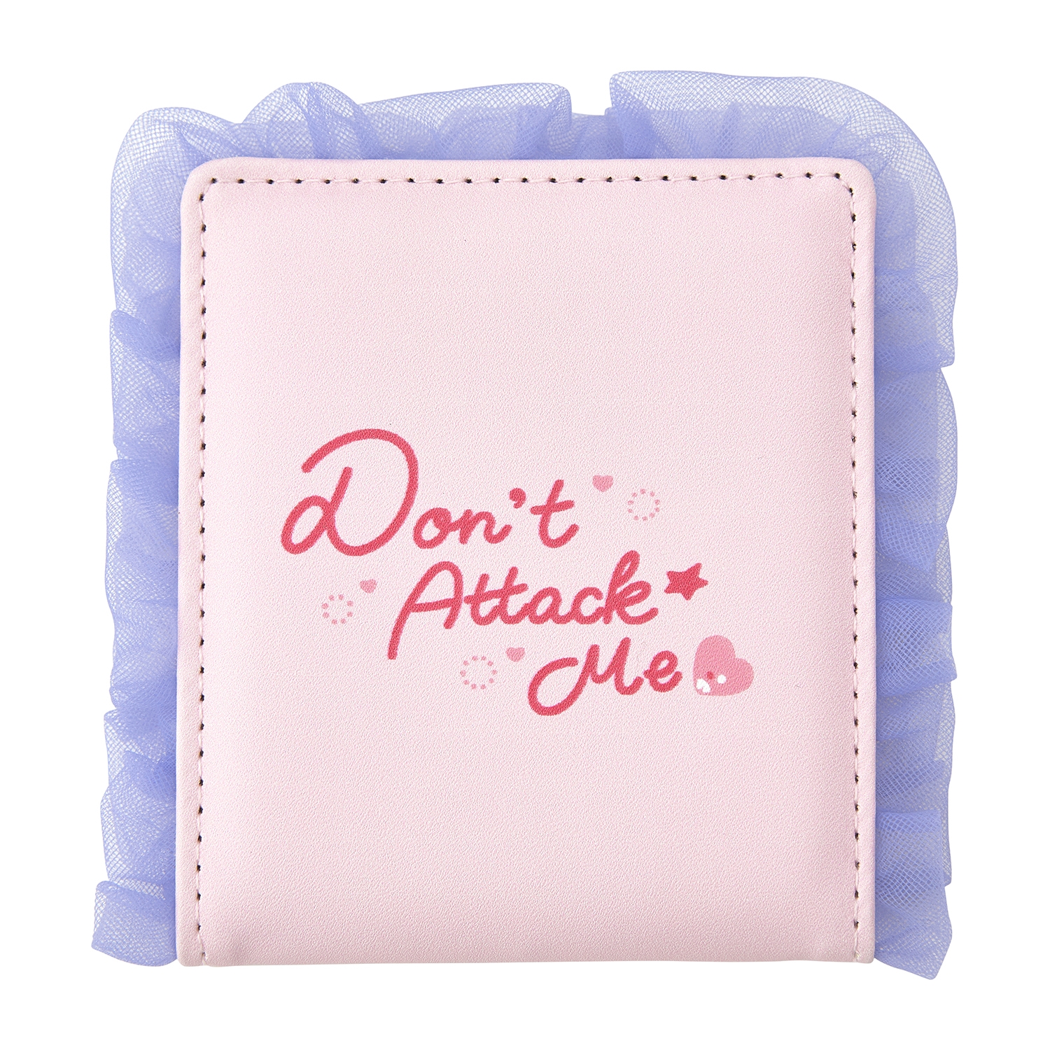 Folded compact mirror with a pink cover printed "Don't Attack Me" and a purple ruffled edge.