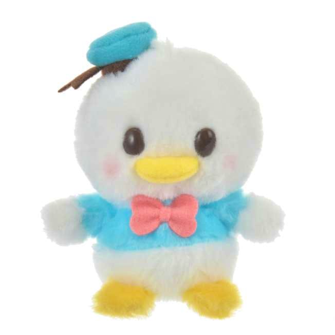 Front view of the Donald plush wearing a blue top, pink bow, yellow beak and feet, and a small blue hat.