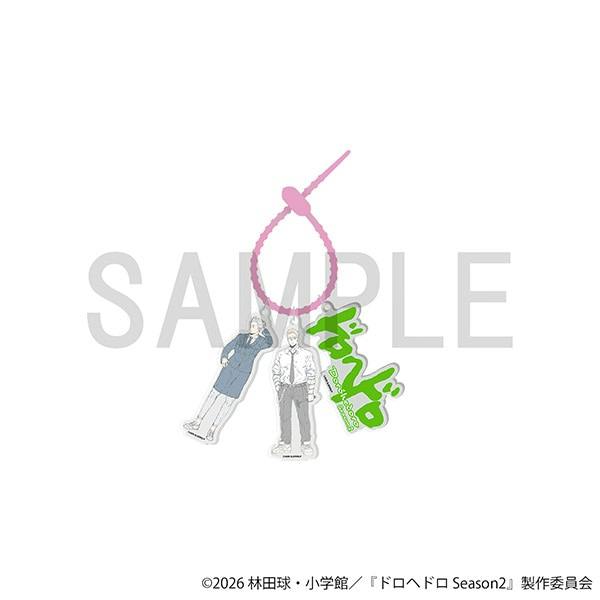Three acrylic keychains (Shin, Nōi, and a logo) attached to a pink strap against a white background with a SAMPLE watermark.