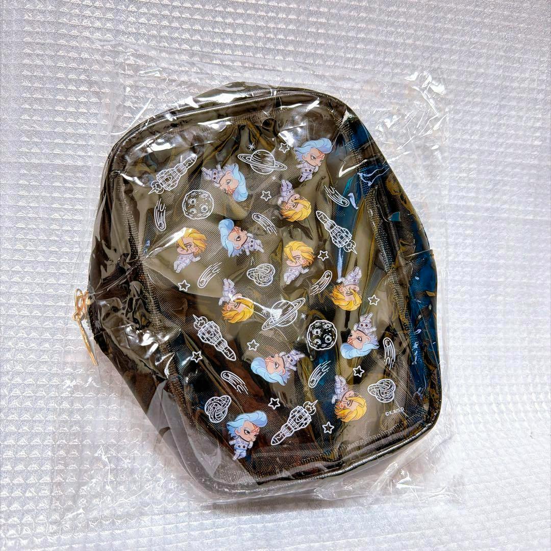 Clear plastic pouch with small chibi character faces and space-themed icons, shown in sealed packaging.