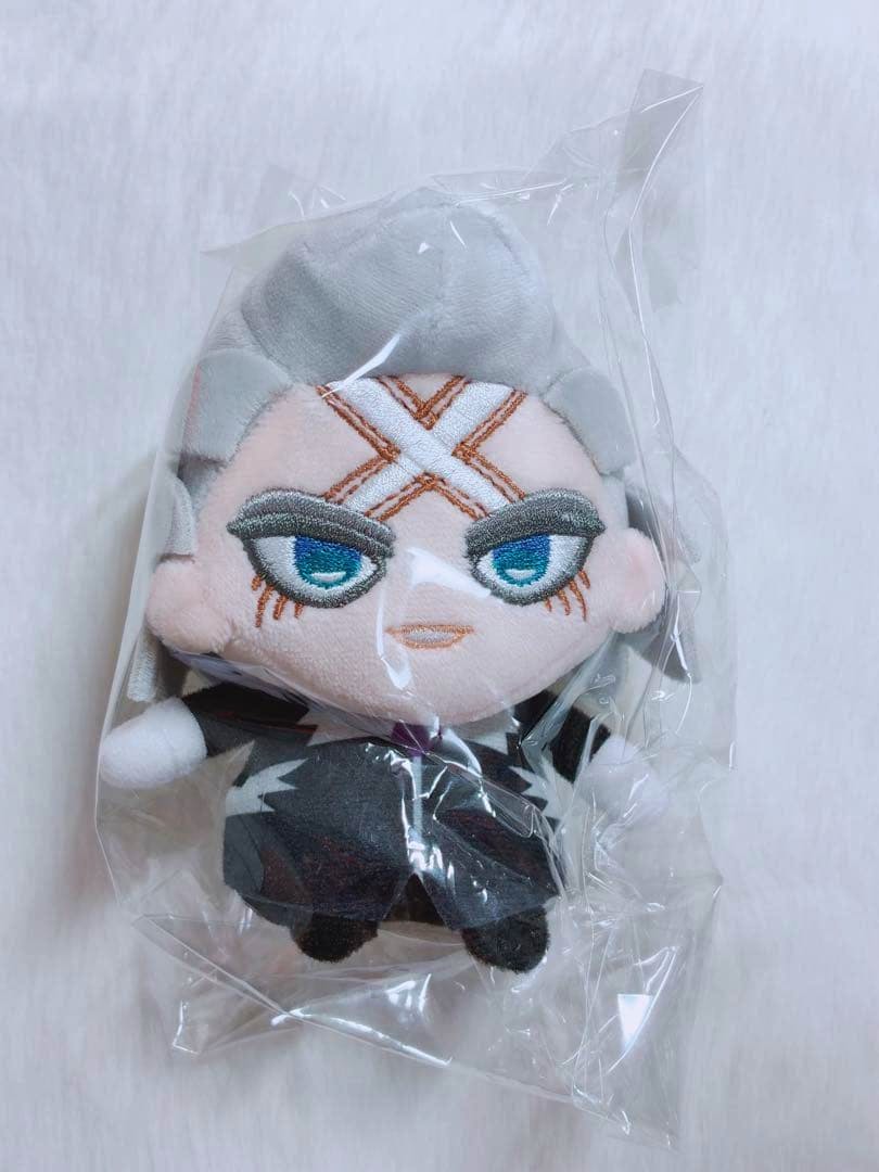 Front view of the Dr.STONE 'ホワイマンといっしょ' Zeno plush toy inside clear plastic packaging.