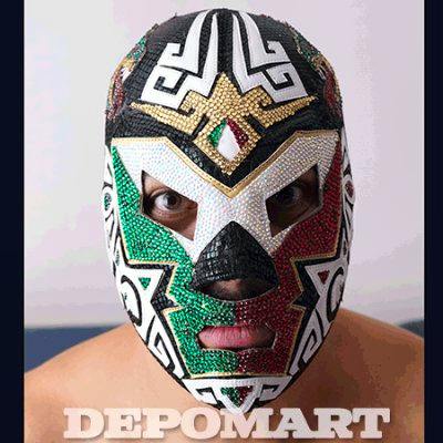 Person wearing the rhinestone-decorated Mexican-color wrestling mask covering the face.