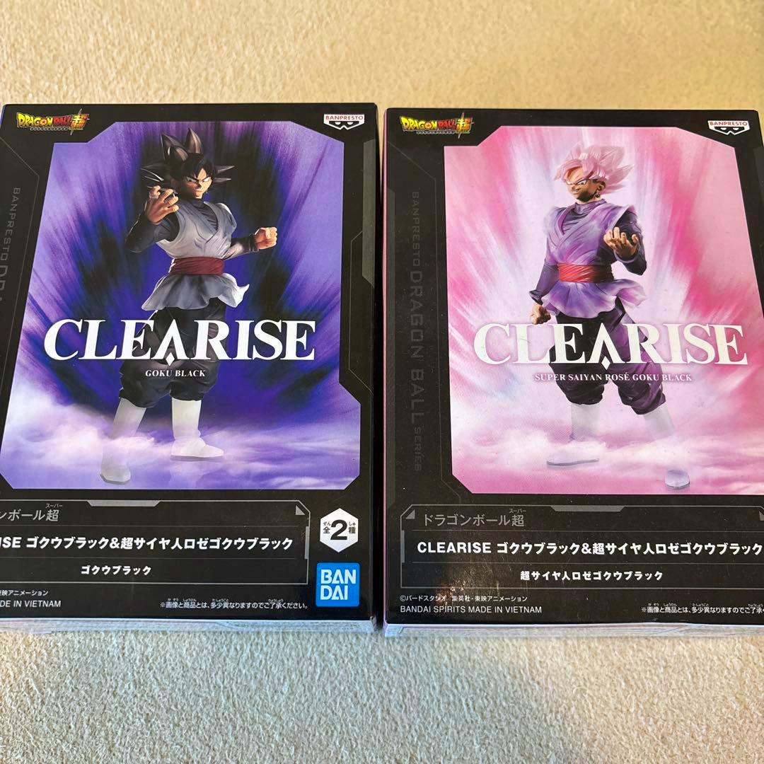 Front view of two CLEARISE Dragon Ball Goku Black figure boxes (two variants) shown side by side.