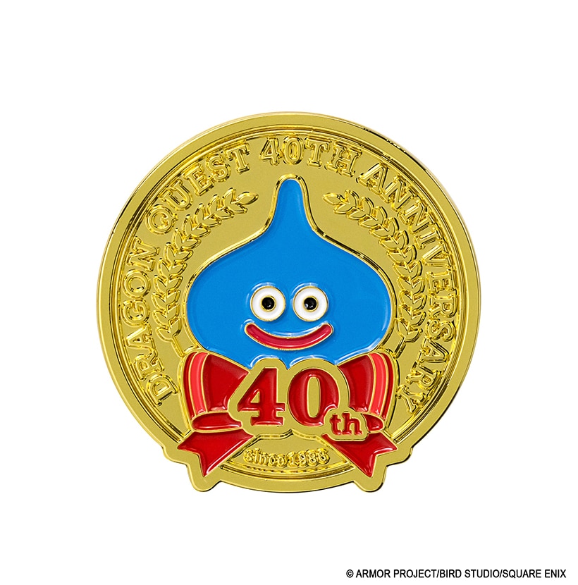 Front view of a gold circular Dragon Quest 40th anniversary pin with a blue Slime and a red "40th" ribbon.