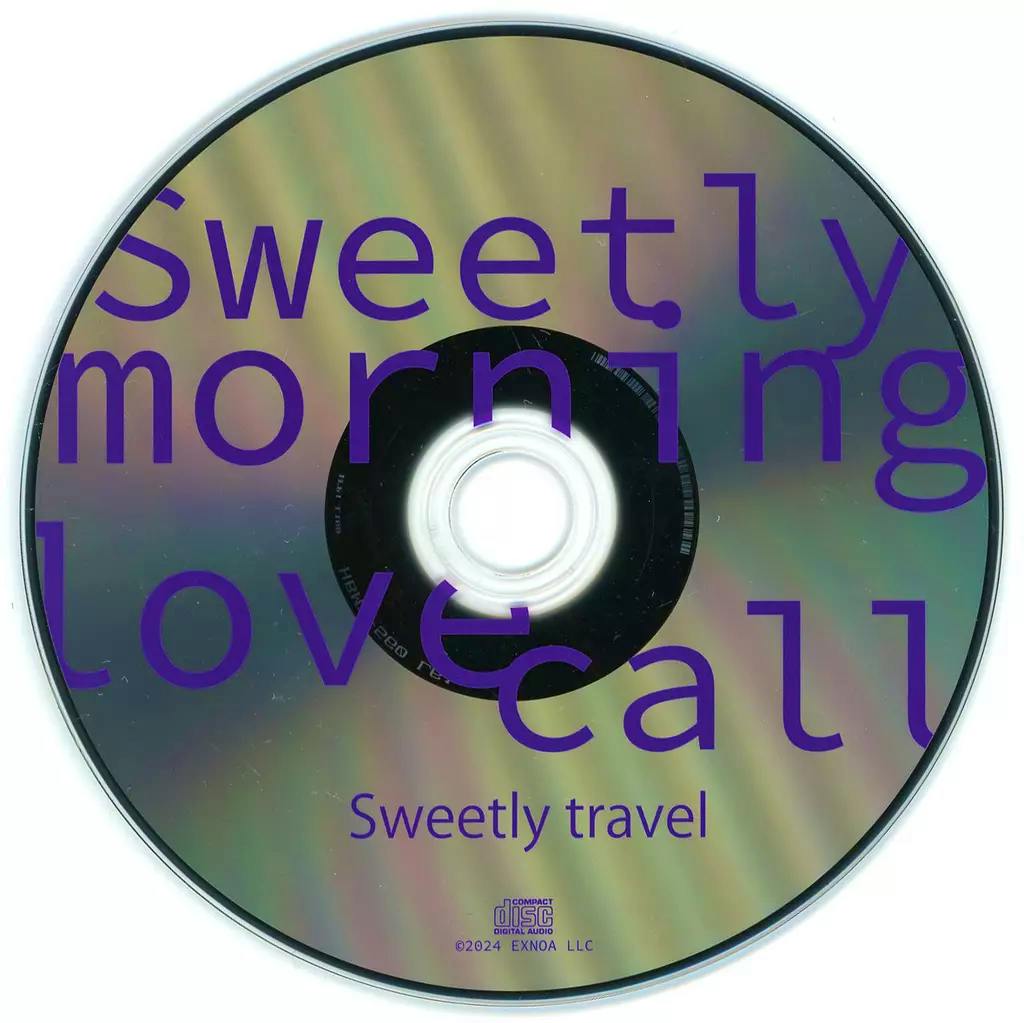 Photo of the drama CD disc showing an iridescent surface with purple text reading "Sweetly morning lovecall" and "Sweetly travel".