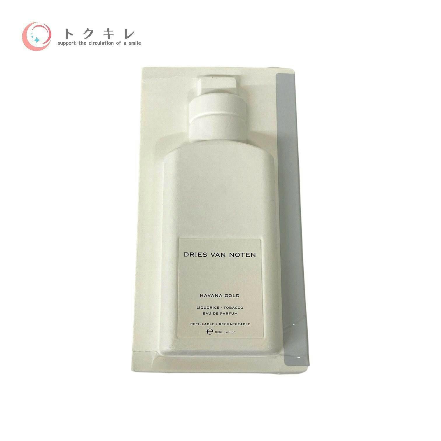 Front of a white Dries Van Noten "Havana Gold" 100ml perfume refill bottle in its packaging showing the brand label.
