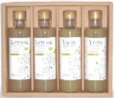 Four bottles of lemon and yuzu vinegar shown as a boxed set.
