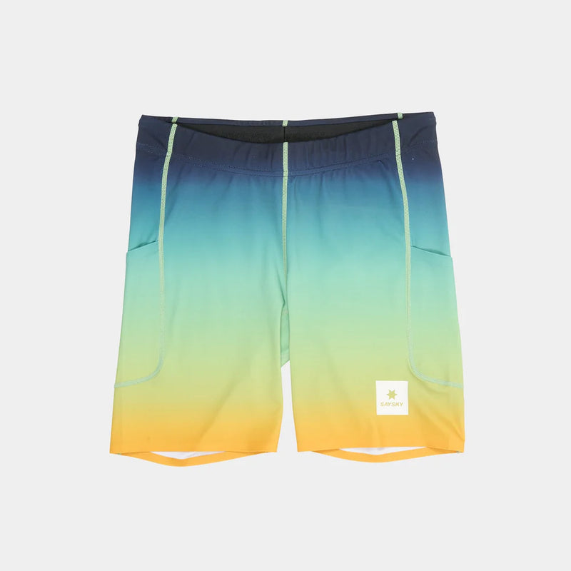 Front view of the men's Drip Dye 7-inch blue-to-yellow short tights showing side pockets and a small logo patch.