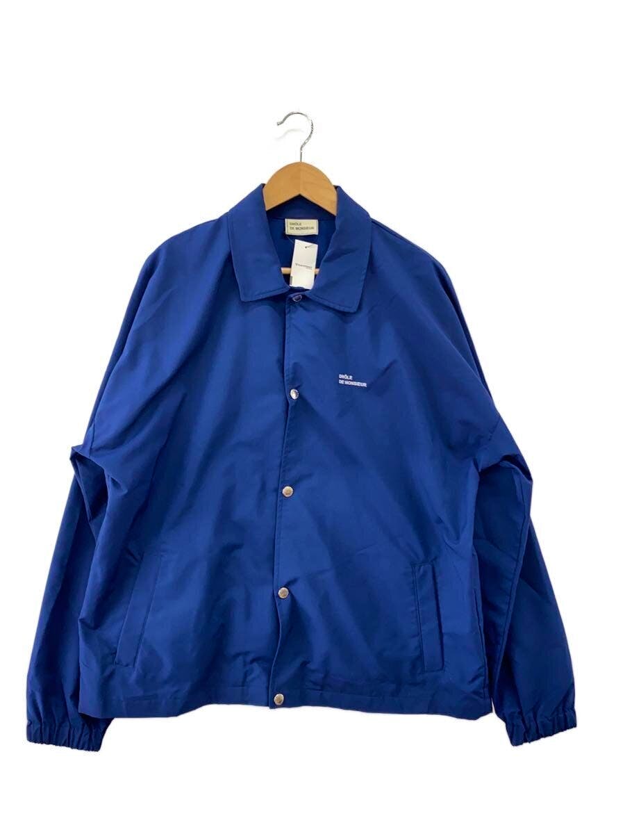 Navy DROLE DE MONSIEUR nylon coach jacket displayed on a hanger against a white background.