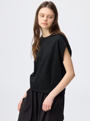 Model wearing a black T-shirt shown in a three-quarter view.