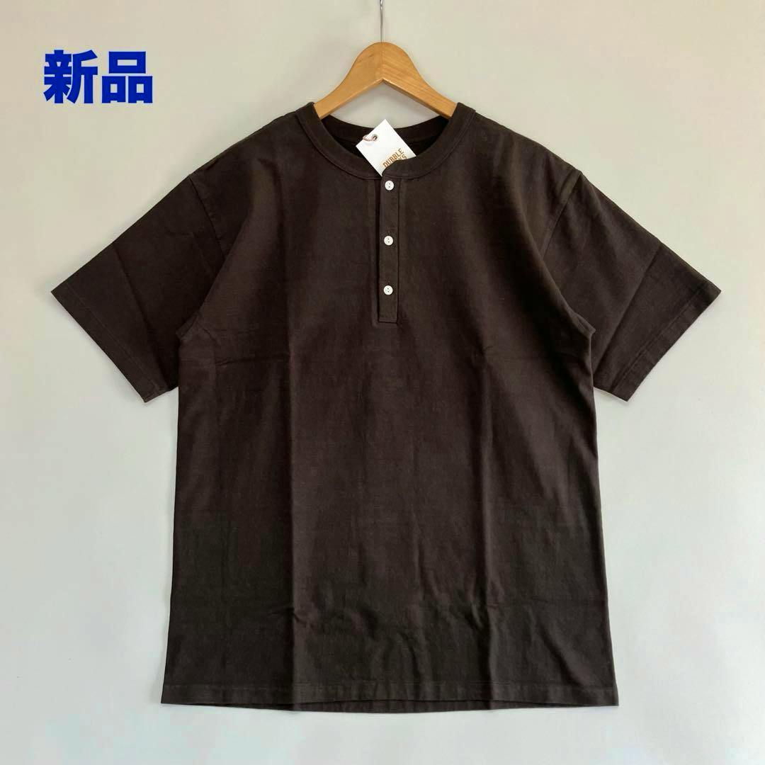 Front view of a dark charcoal henley-neck short-sleeve cotton T-shirt with a three-button placket hanging on a wooden hanger.