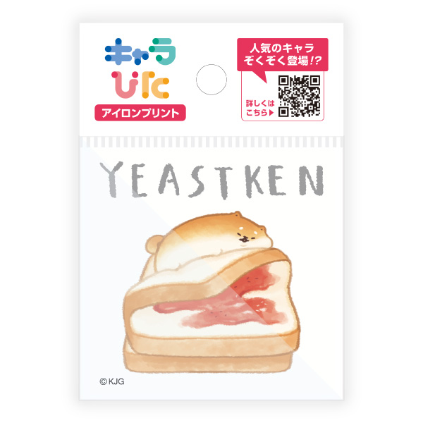 Packaged mini iron-on decal sheet showing the word "YEASTKEN" and a cartoon small animal on a slice of bread.