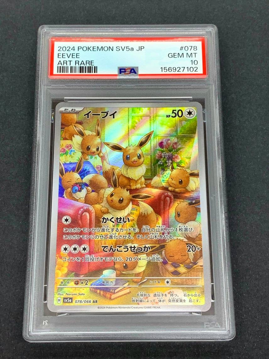Front of an Eevee AR trading card (SV5a 078/066) in a PSA-graded plastic slab showing the holographic artwork and label.