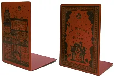 Two wooden Pokémon bookends from the La Maison de Eievui series showing decorative printed Eevee and evolution designs.