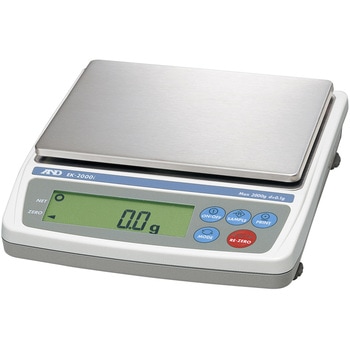Compact electronic kitchen scale (EK-i series) with a stainless steel weighing platform and a digital display showing 0.0 g.