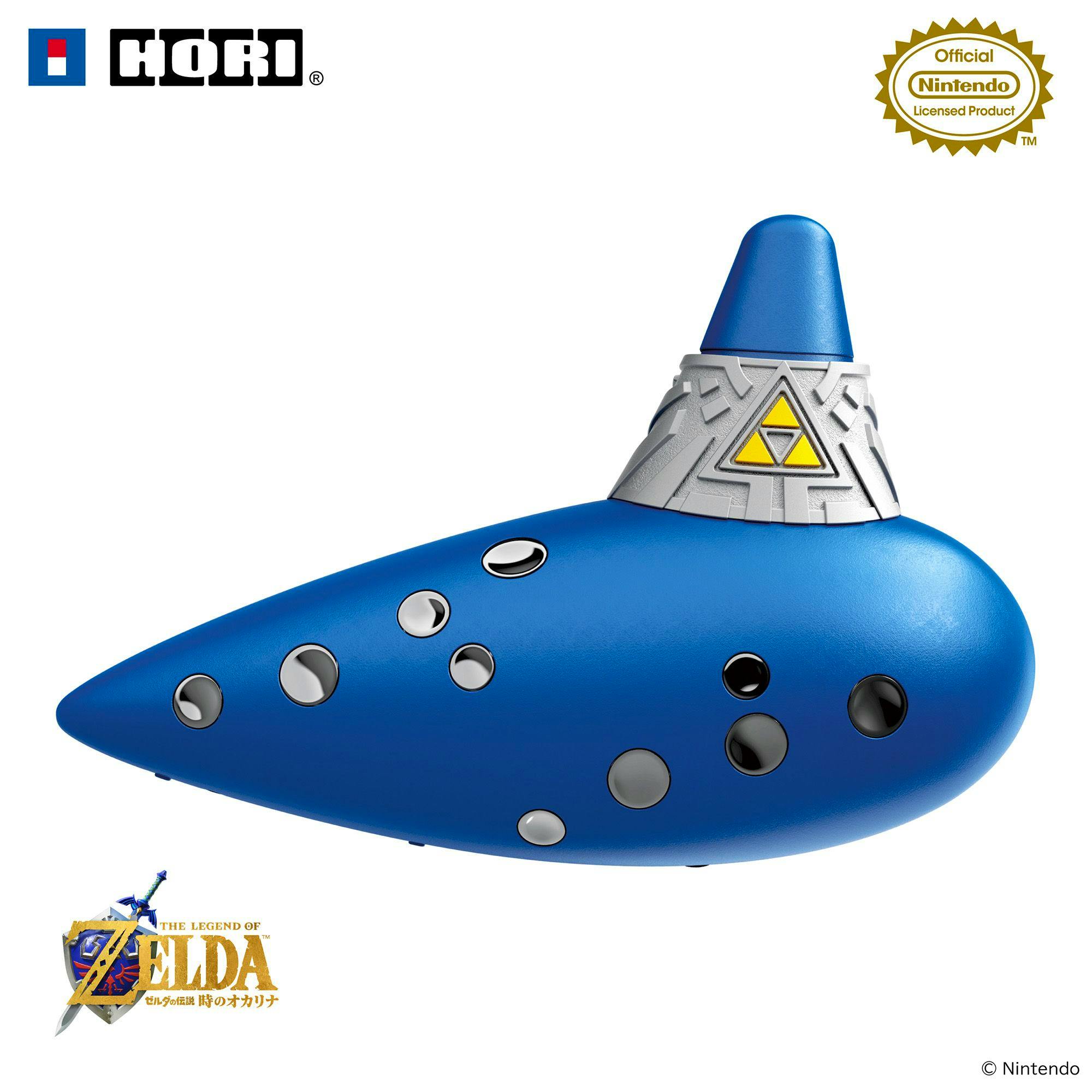 Close-up of the blue ocarina-shaped video game controller showing silver finger holes, a decorative Triforce emblem, and Hori and Nintendo logos on a white background.