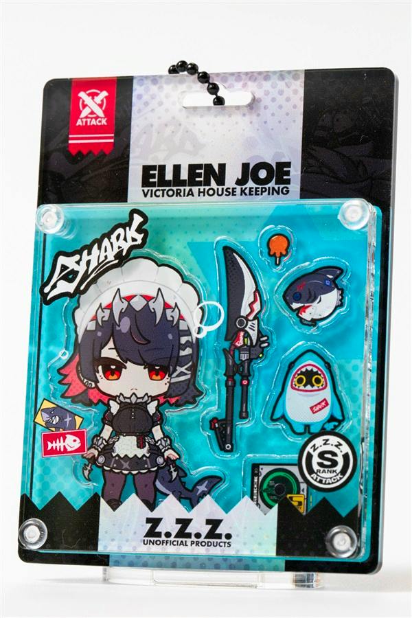 Front view of a blister-pack style acrylic keychain set for Ellen Joe showing the acrylic keychain character and accessory pieces on a backing card.