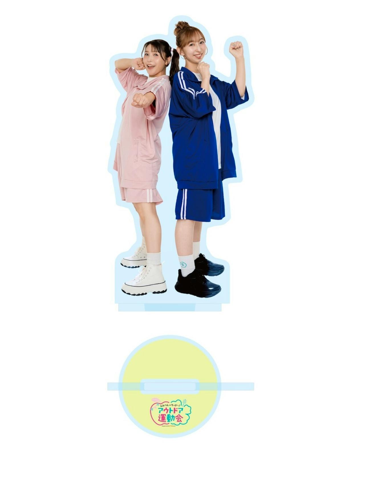 Cutout acrylic stand showing two people posing back-to-back with the round printed base visible below.