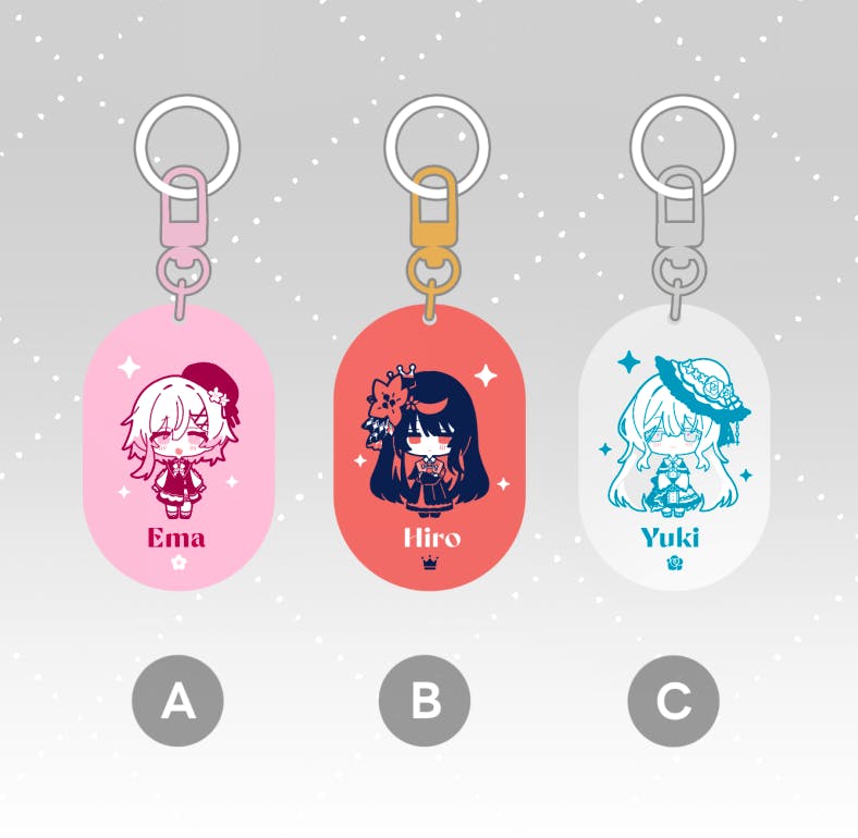 Mockup of three metallic acrylic keychains labeled A, B, and C showing Ema, Hiro, and Yuki character designs.