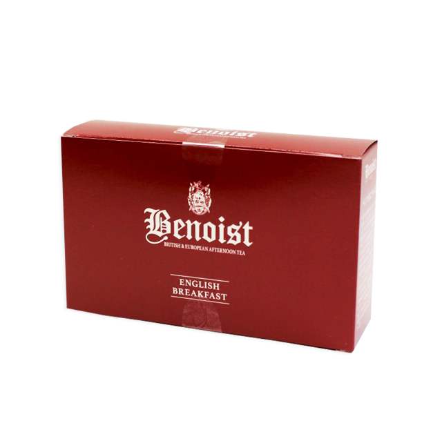 Red box of English Breakfast black tea bags in its packaging.