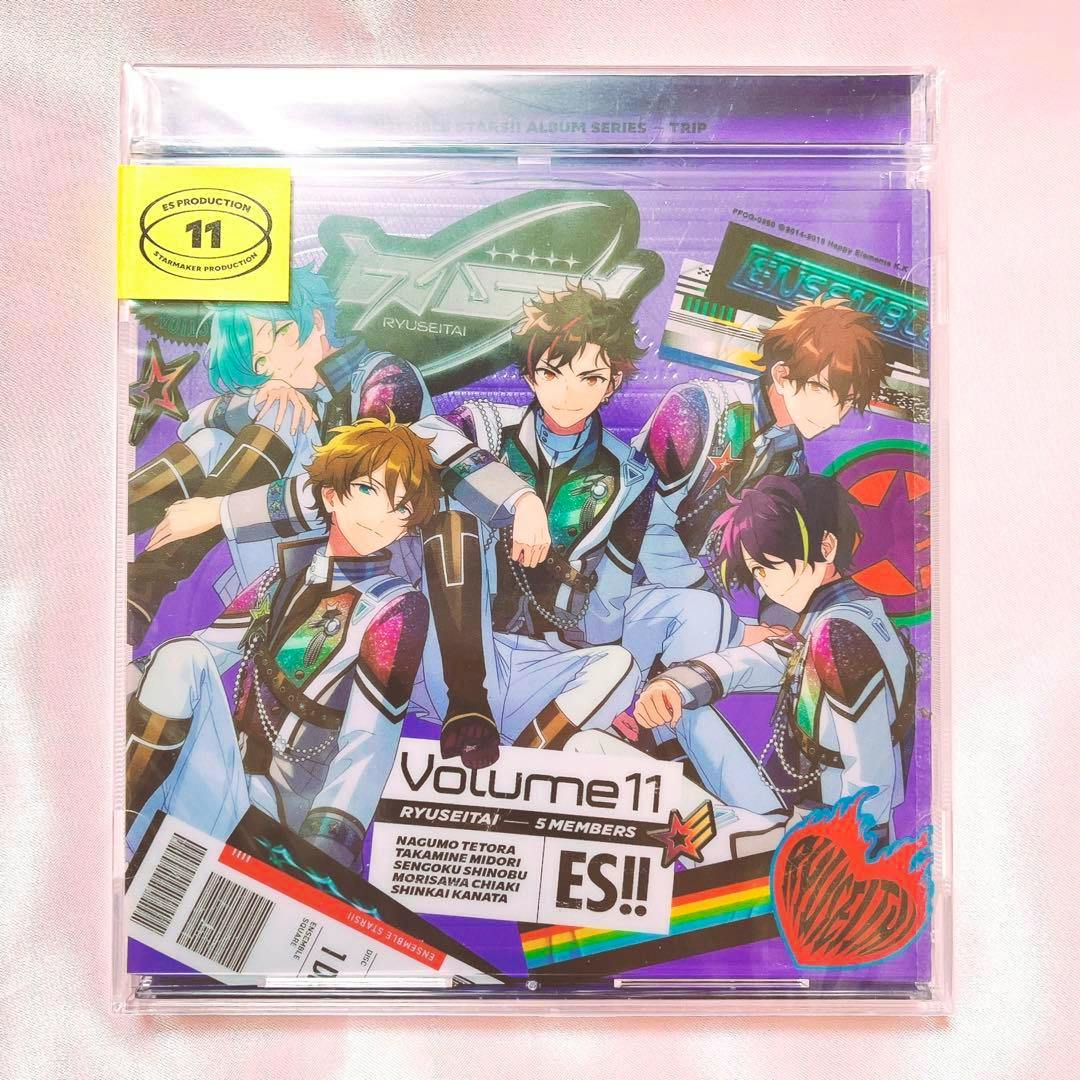 Photograph of the CD jewel case front showing the あんさんぶるスターズ!! TRIP 流星隊 Volume 11 cover art with five illustrated members and title text.