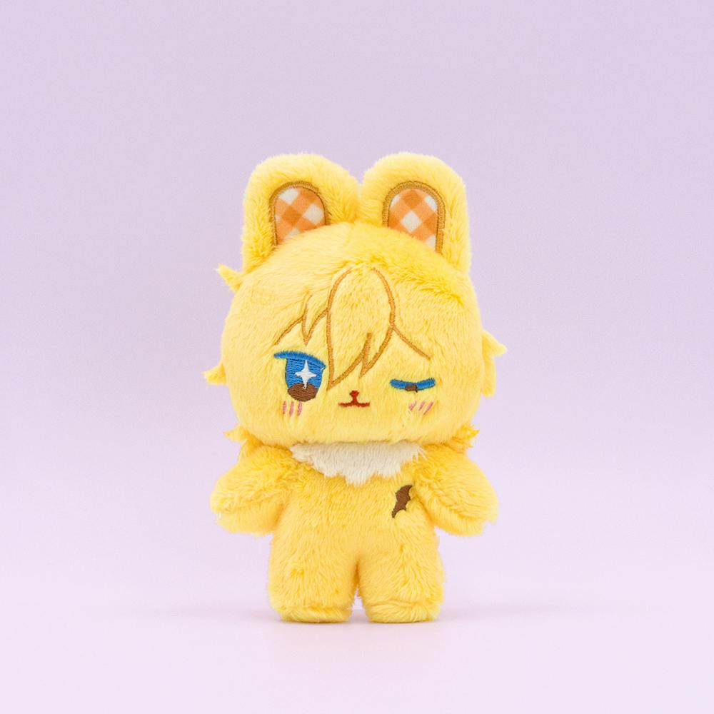 Front view of a yellow fluffy toy plush from the いつぬいもっふる UNDEAD series against a light purple background.
