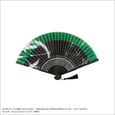 A green and black folding paper fan with a black tassel displayed on a white background.