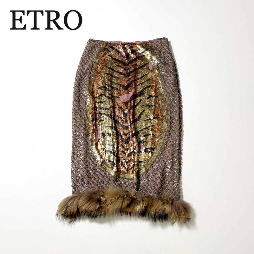 Flat-lay photo of an ETRO women's sequined party skirt with fur trim laid against a white background.