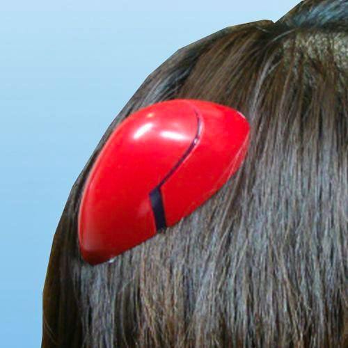 Red Asuka interface headset hair pin clipped into dark hair against a light blue background.