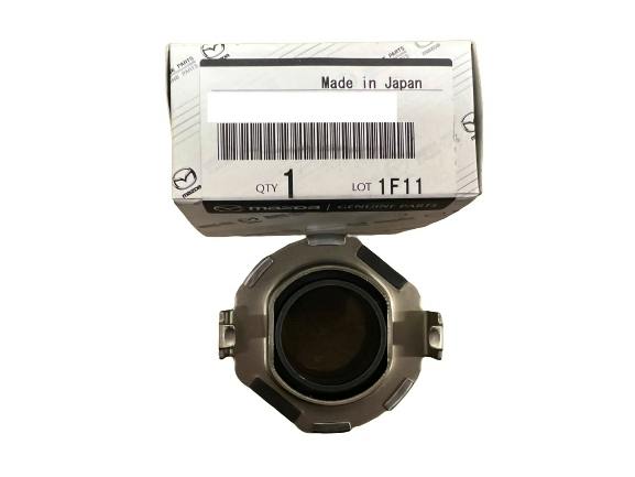 Clutch release bearing assembly shown in front of a box labeled "Made in Japan".