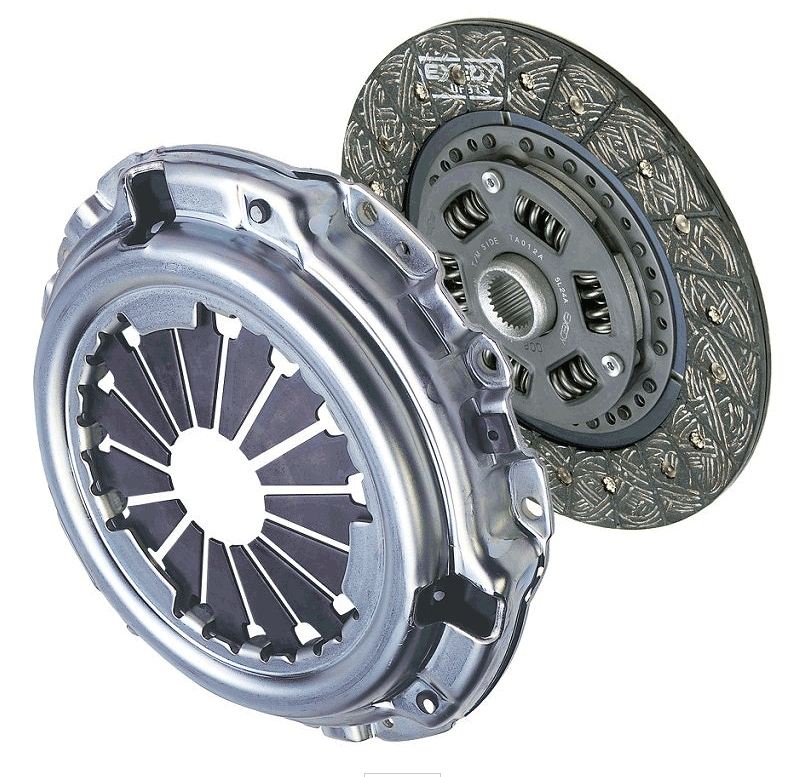 A clutch pressure plate and clutch disc shown together as the car clutch set.