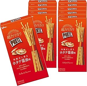 Several red boxes of Ezaki Glico Pretz snack with images of the thin biscuit sticks on the box fronts.