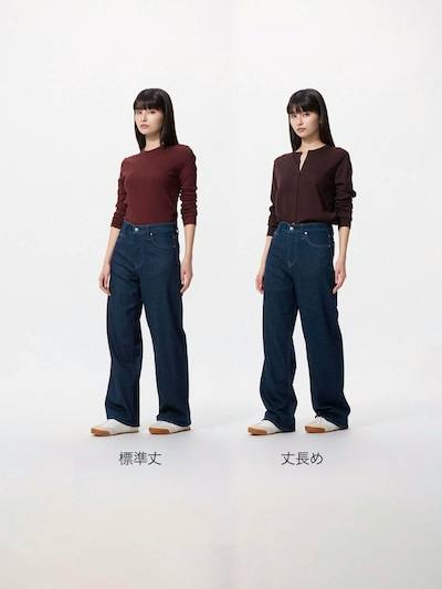 Two models wearing wide straight jeans in a dark blue wash shown side-by-side on a white background.