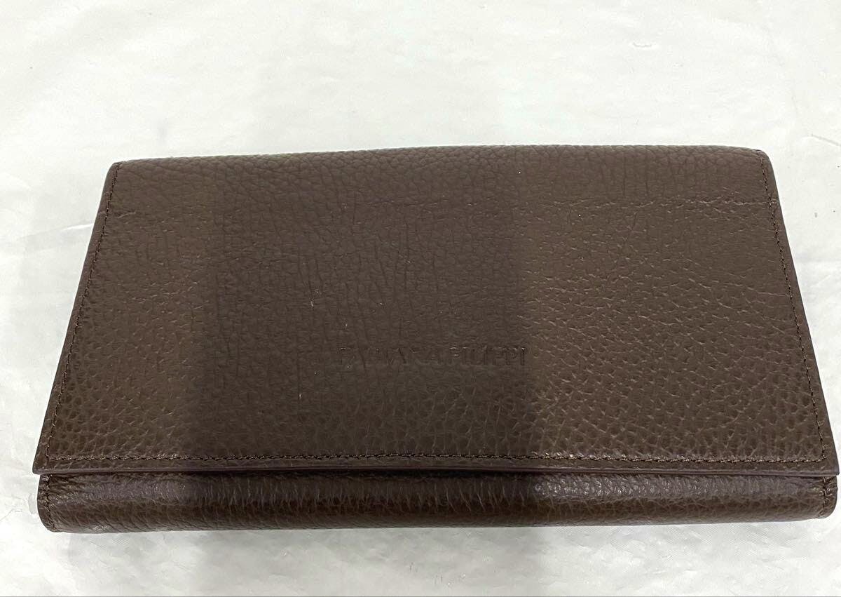 Brown cow leather long wallet (FABIANA FILIPPI) shown flat with the front exterior visible.