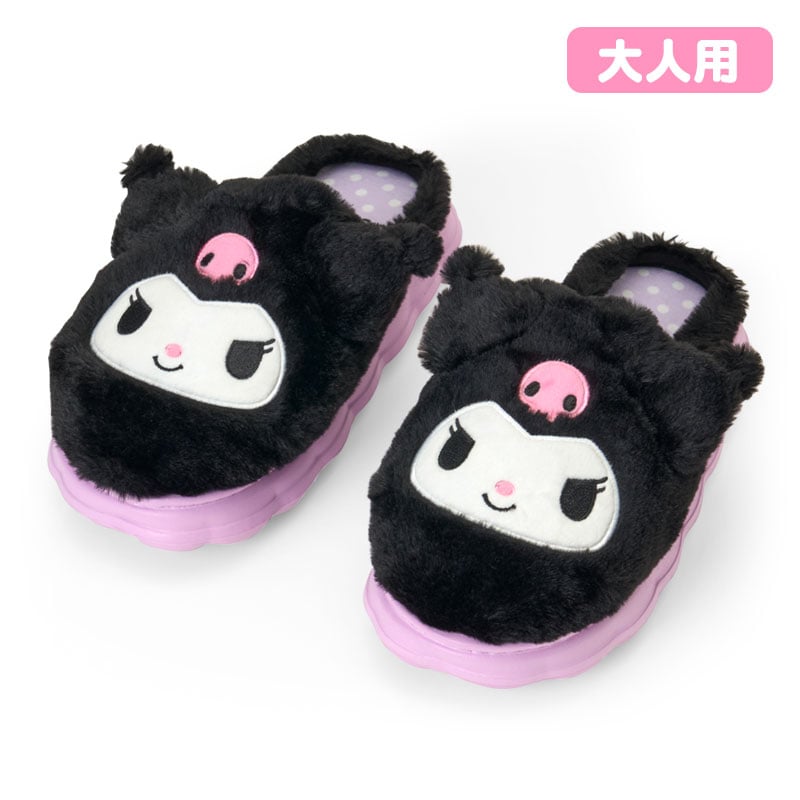 Black plush face-shaped slippers with pink soles shown on a white background.