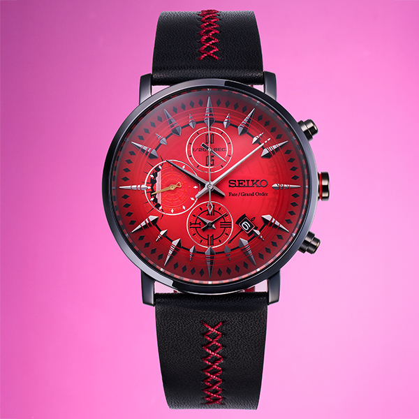 Front view of the Fate/Grand Order オリジナルサーヴァントウォッチ アーチャー/バーヴァン・シー model watch showing a red dial and a black leather strap with red stitching.