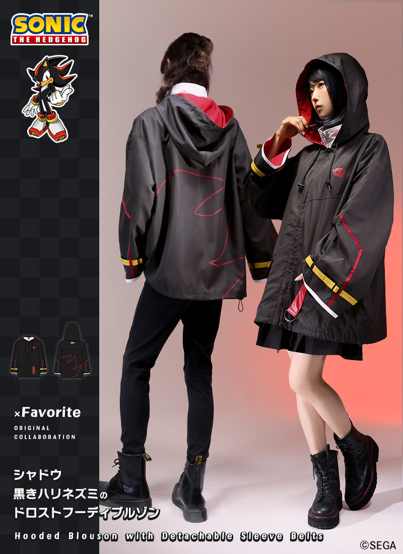 Two models wearing the black Shadow drawstring hooded blouson, showing front and back views of the jacket.