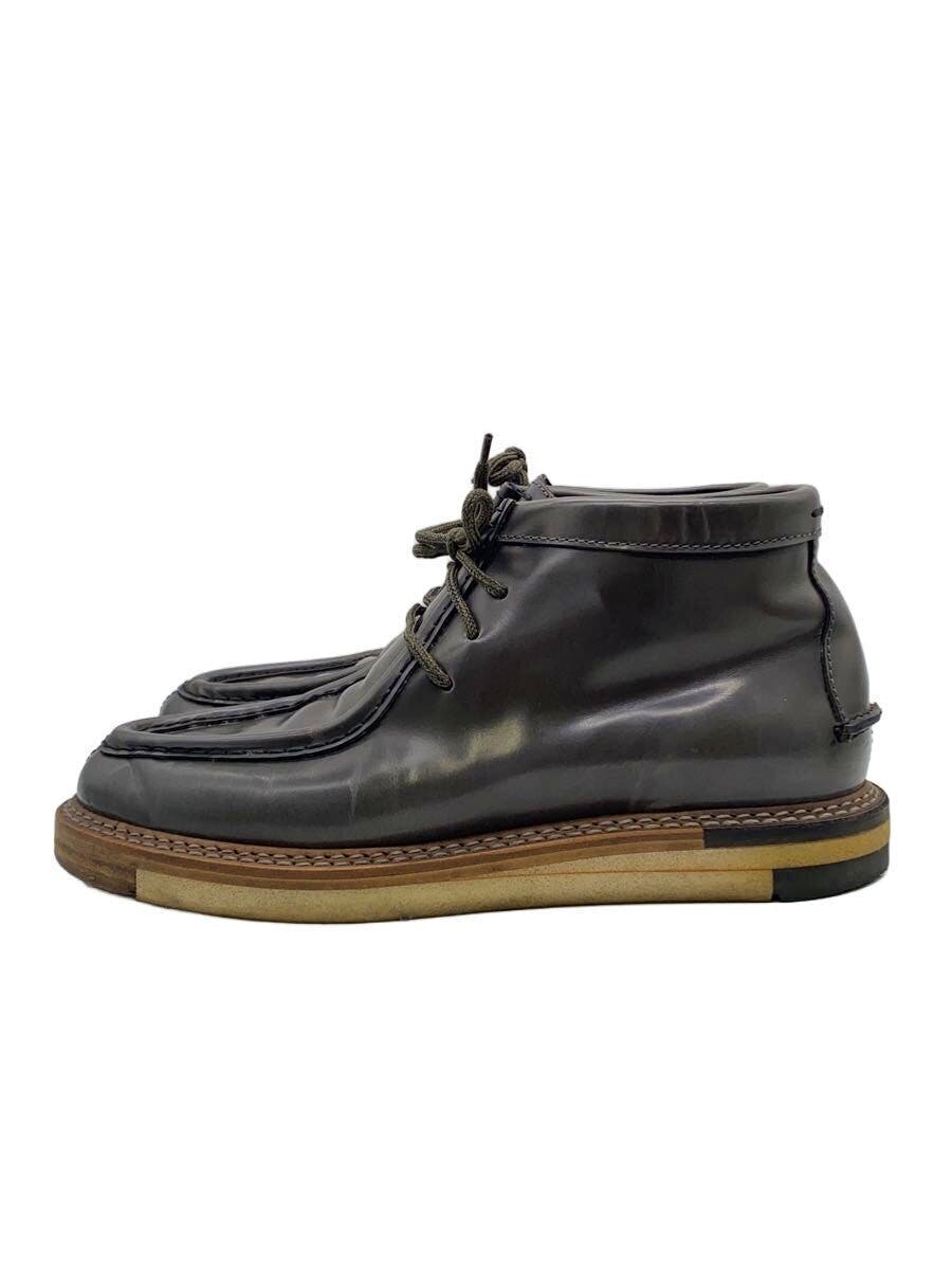 Side profile of a FENDI leather Tyrolean-style shoe with laces and a layered sole.