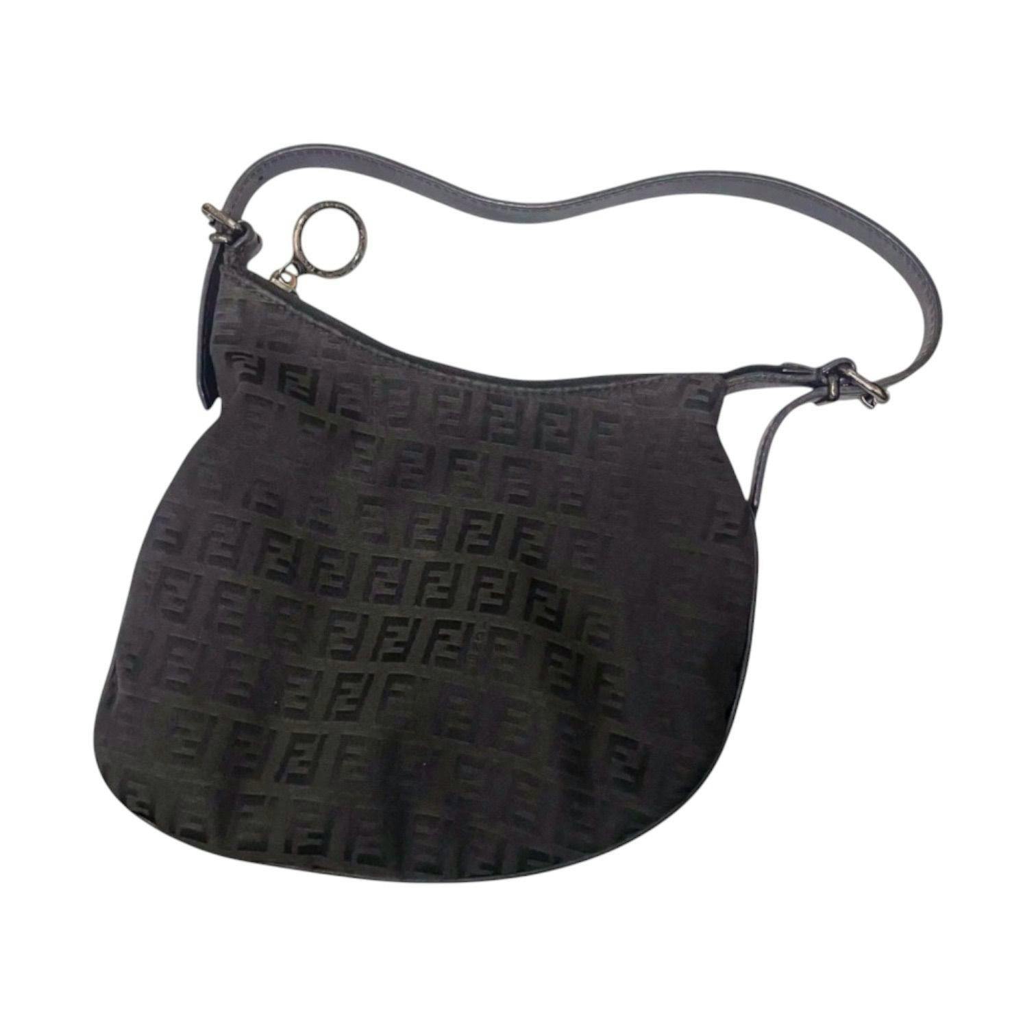 Black Fendi mini oyster shoulder bag with Zucca (FF) canvas pattern and single leather strap on a white background.