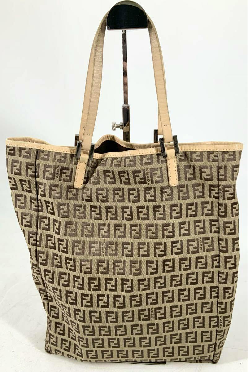 Beige FENDI canvas tote bag with all-over FF Zuccino monogram and leather shoulder straps.