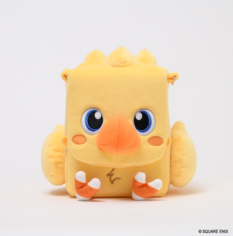 Front view of the yellow Chocobo polyester pouch (fluffy sling deck box) showing its face, wings, and small feet.