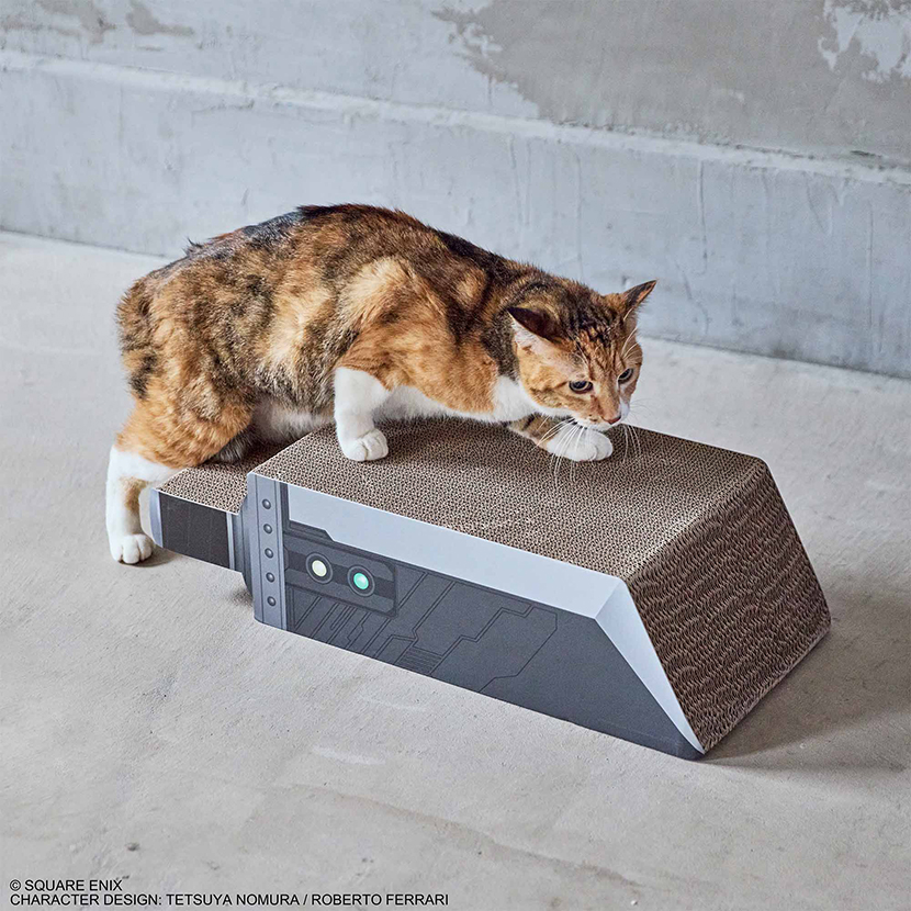A cat using the FINAL FANTASY PETs Buster Sword cat scratcher with printed sword-side details.