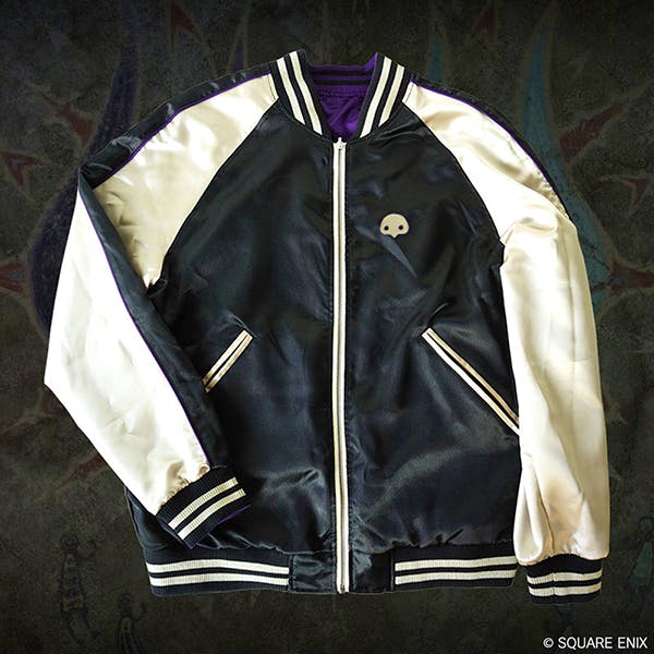 Flat-lay front view of the Final Fantasy XIV embroidered jumper with a black body, white sleeves, zip front, striped cuffs, and a small chest emblem.