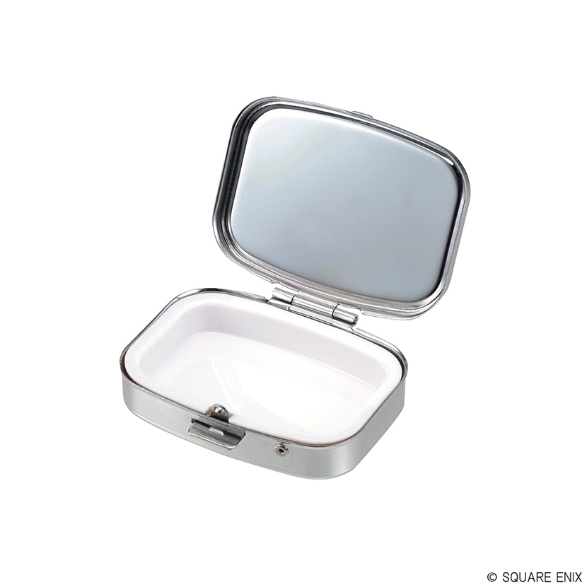 Open tinplate mini case showing a white interior and metal exterior with a hinged lid.