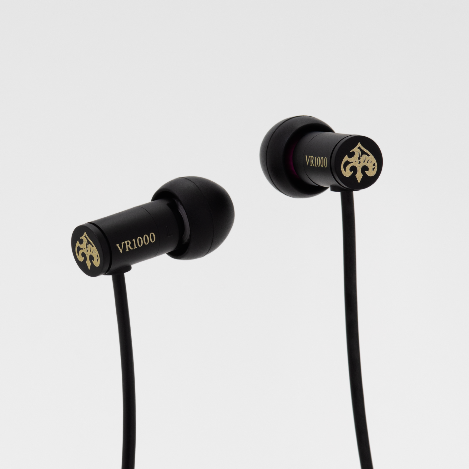 Black VR1000 in-ear earphones with gold logo on the housings against a white background.