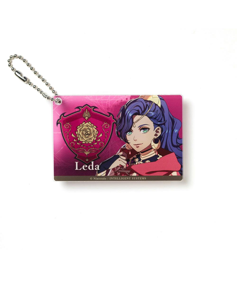 Rectangular acrylic keychain depicting Leda and a rose crest on a pink background with a silver ball chain.